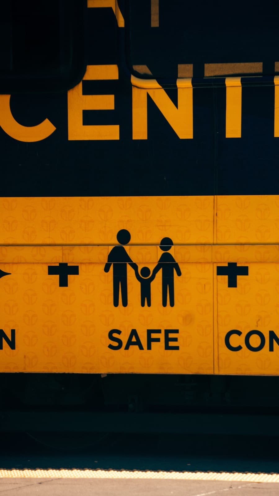 A TravelSafe vehicle marked with a family safety symbol
